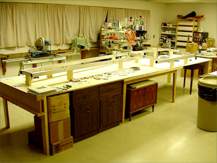Affordaplane fuselage construction layout on a workshop bench